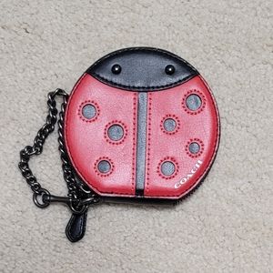 Round Coach Ladybug Wristlet